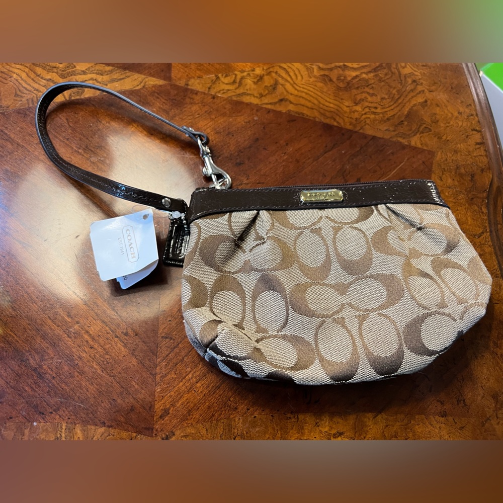 NWT Coach signature jacquard wristlet
